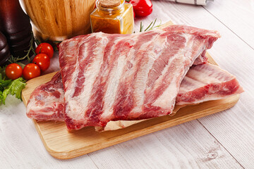 Wall Mural - Raw pork ribs over board