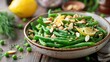 © Karl - Bowl of green beans almondine with lemon. Thanksgiving side dish