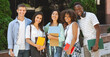 © Prostock-studio - Portrait of happy international students posing outdoors near university building, smiling and embracing, taking group photo, panorama