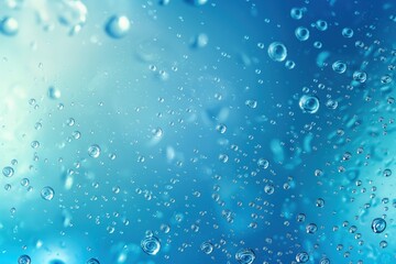 Canvas Print - Water droplets on a blue background close-up