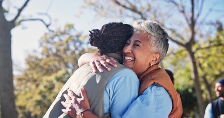 Wall Mural - Happy woman, volunteer and nature with hug for community service, embrace or love together at park. Female person, friends or team with smile for support or difference in NGO, partnership or unity