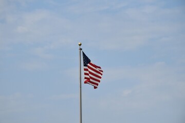 Wall Mural - American Flag on a Flagpole