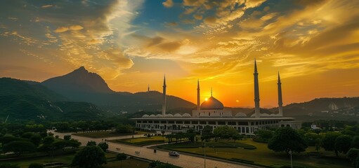 Wall Mural - Islamic mosque with minaret in the evening sunset