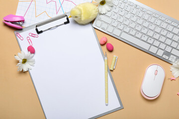 Wall Mural - Blank clipboard with stationery, computer keyboard, chicken, flowers and Easter eggs on beige background