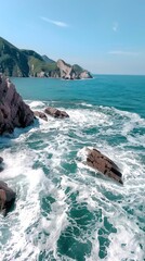 Poster - Rocky Coastline with Breaking Waves and Distant Green Hills