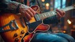 © CreativeVista - Jazz Guitarist's Hands Playing Vintage Hollow-Body Electric Guitar