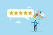 © Nuthawut - 5 Stars review, customer feedback evaluation, best quality or satisfaction, opinion, best rating reputation or online positive review concept, customer giving 5 stars rating or customer experience.