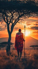 Sticker - Maasai Warrior Standing with Spear at Sunset in African Savanna