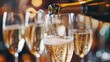 © Anna - Close up image of champagne being poured into elegant glasses, with a sparkling bokeh background. Celebrations, festive events, and luxury lifestyle themes.
