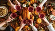 © Dmitrii - family praying holding hands at thanksgiving table. flat-lay of feasting peoples hands over friendsgiving table with autumn food candles roasted turkey and pumpkin pie over wooden table top view