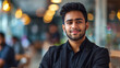 © PRASANNAPIX - young indian businessman standing at office
