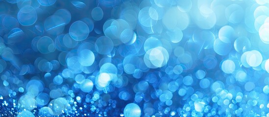 Wall Mural - Blue themed abstract bokeh background with copy space image included