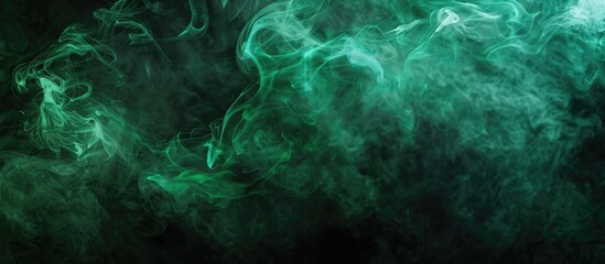 Poster - Black backdrop with green smoke providing a copy space image