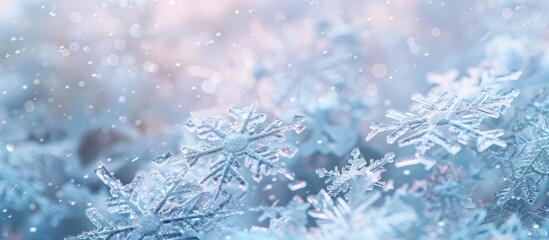 Fototapete - Winter themed background with white artificial snowflakes on soft light backdrop ideal for cards banners and posters with copy space image