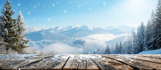 Poster - A weathered wooden board with snowflakes mountains forests a clear blue sky sunlight frost and copy space image