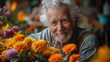 © 1000lnw - Senior man surrounded by beautiful flowers.