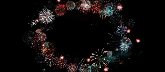 Canvas Print - Fireworks form a colorful circular frame on a black background with copy space image