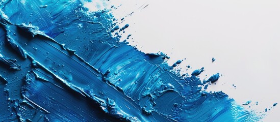 Leinwandbilder - Toned primer creates a saturated blue abstract backdrop on white with copy space image