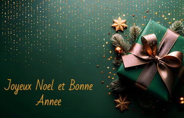 Joyeux Noel et Bonne Annee, Christmas greeting card french, xmas gift box top view on green background  banner.Copy space