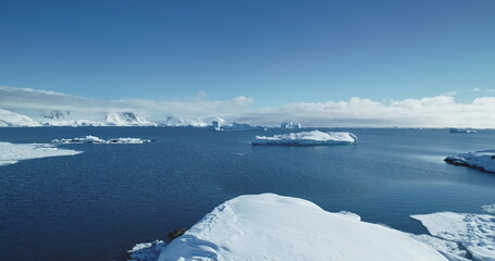 antarctica winter landscape wild nature beauty. towering snow covered icebergs melting in polar ocea