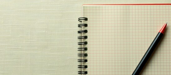 Aufkleber - Notepad and pen on a blank backdrop with ample copy space image