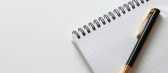Aufkleber - Notepad and pen on a blank backdrop with ample copy space image