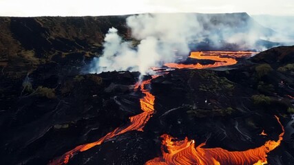 Sticker - Aerial footage of a river of lava flowing down a mountainside leaving a trail of destruction in its wake.