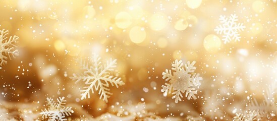 Canvas Print - Blurred golden background with white bokeh snowflakes and copy space image