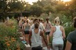 © Milos - A group of people exercises in an outdoor park surrounded by greenery and flowers, enjoying physical fitness and the tranquility of nature during a warm, sunny day.