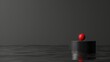 © Suphot - Abstract image of a red sphere on a black platform in a minimalist dark space with reflection on the water surface.
