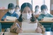 © LukaszDesign - Classroom student wearing a mask for hygiene and corona virus flu protection. Little girl ready to learn in kindergarten, preschool, or primary school.