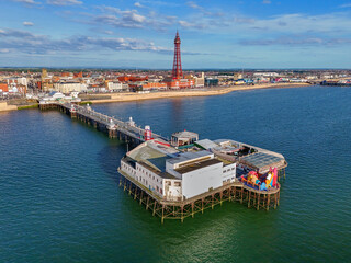 Aerial Image of Blackpool Tower along the Fylde Coast, Lancashire during a lovely Summer evening on the Sea front. 28th July 2024.