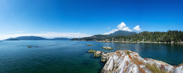 Wall Mural - Rocky Shore on West Coast of Pacific Ocean. Sunny Summer Day.