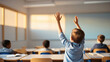 © Edwin - Children interacting in classroom, raising hands