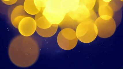 Wall Mural - christmas golden light shine particles bokeh on navy blue background. holiday concept. abstract back