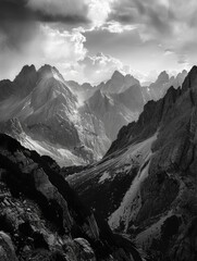 Poster - A mountain range with snow on the peaks and a cloudy sky. The mountains are very tall and the sky is overcast