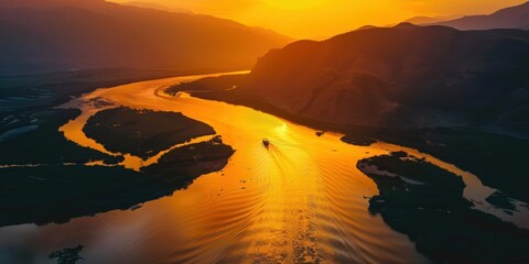 Wall Mural - Serene Sunset Over River Winding Through Mountains