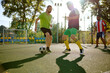 © Nomad_Soul - Street football on city soccer field