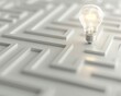 © CHONCHANOK PHOTO - A clean 3D model of a maze with a lightbulb at the center, representing finding innovative solutions in business