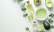 © anatoliycherkas - Natural Skincare Ingredients with Avocado, Essential Oils, and Eucalyptus Leaves