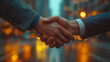 © wassana - Two men shaking hands in a cityscape
