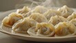 © MakoPoko - A plate of steaming dumplings, the hot vapor curling upwards, emphasizing their deliciously cooked perfection on a plain background.