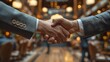 © Dennis - Group of business professionals engaging in networking at a corporate event, exchanging business cards and shaking hands, with a formal setting in the background.