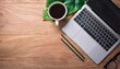 © Abele - Flat lay top view office table desk Workspace with laptopoffice supplies pencil green leaf and coffee cup on wood background