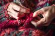 © john - Close-up of hands knitting