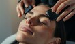 © Valentyna - Professional demonstrating the correct technique for gua sha facial massage