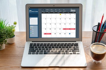 Wall Mural - Calendar on computer software application for modish schedule planning for personal organizer and online business