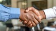 © SHI - phone photo of lawyer shaking hands with clients, in a cozy office