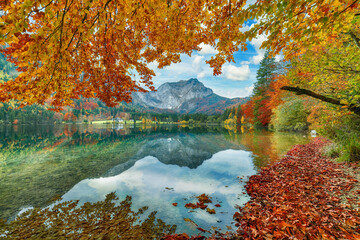 Wall Mural - breathtaking autumn scene of vorderer langbathsee lake.