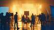 © suldev - commercial video film movie making lighting set professional studio production big working people silhouette scenes behind television camera motion picture equipment crew photo light